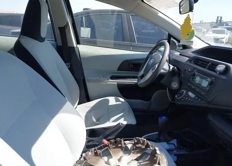 2014 Toyota Prius C One z USA, uszkodzony, nr VIN JTDKDTB33E1559565